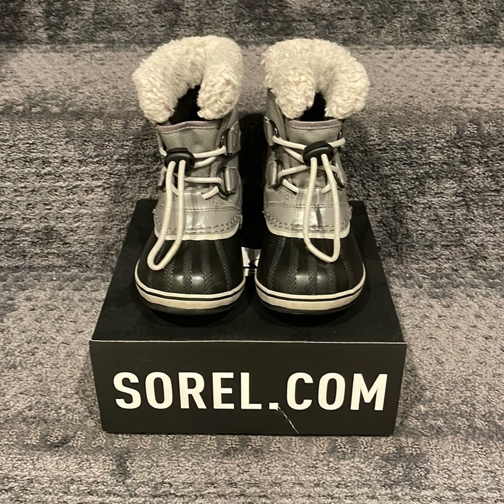 Grey, kids Sorels perfect for the cold.